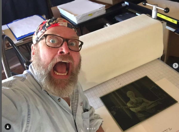 Intaglio Editions Lead Printmaker Jon Lybrook working with a Polymer Photogravure printing plate of Robert Fripp in Krakow, 2018