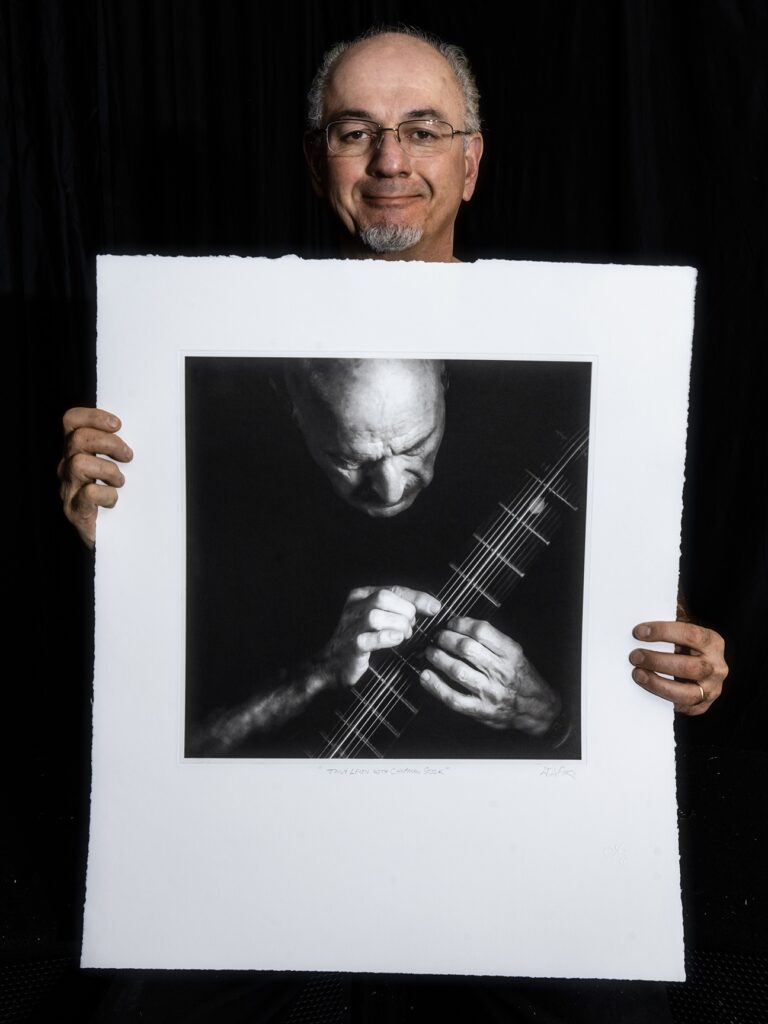 Jerry LoFaro with his portrait "Tony Levin with Chapman Stick".